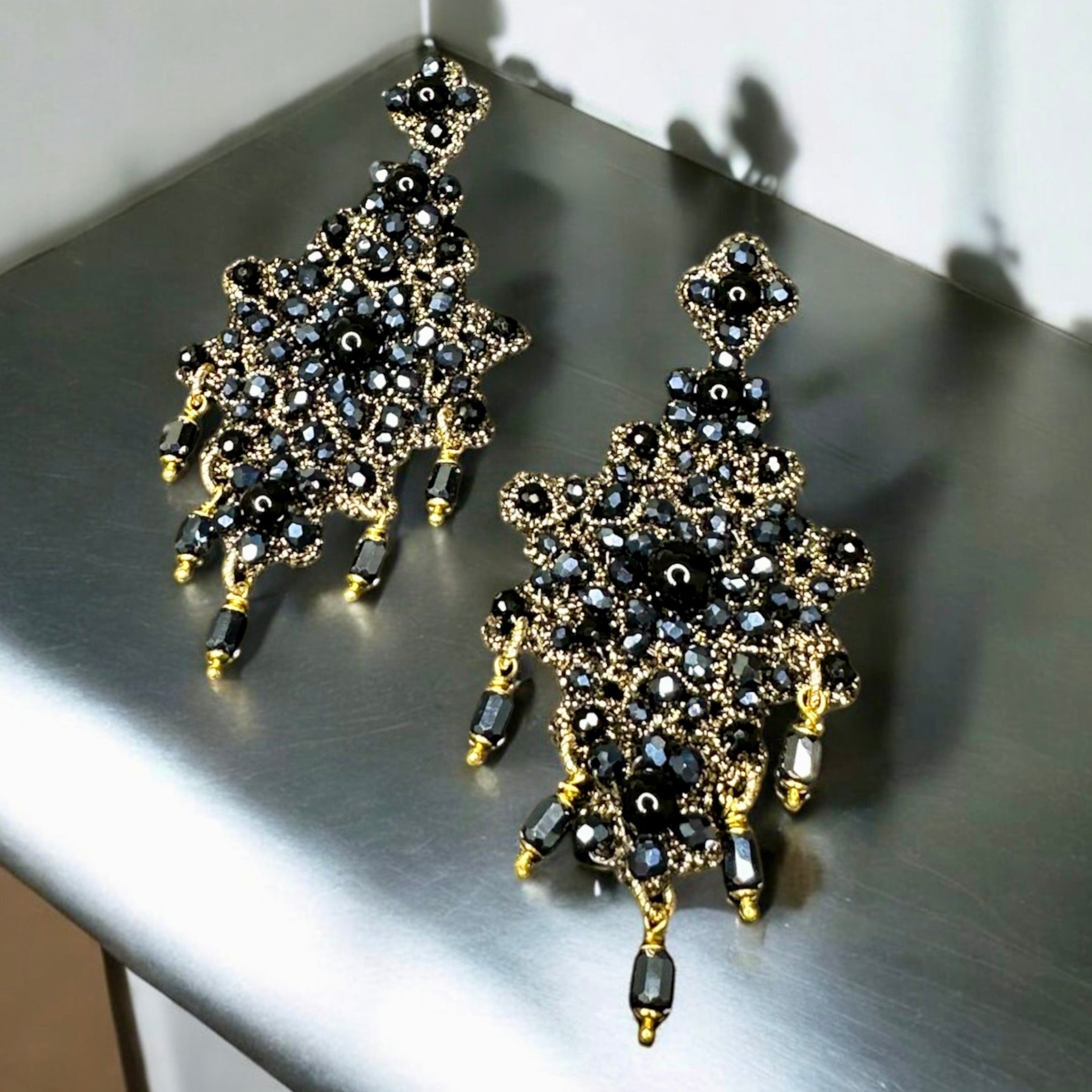 Earrings the heart elsewhere